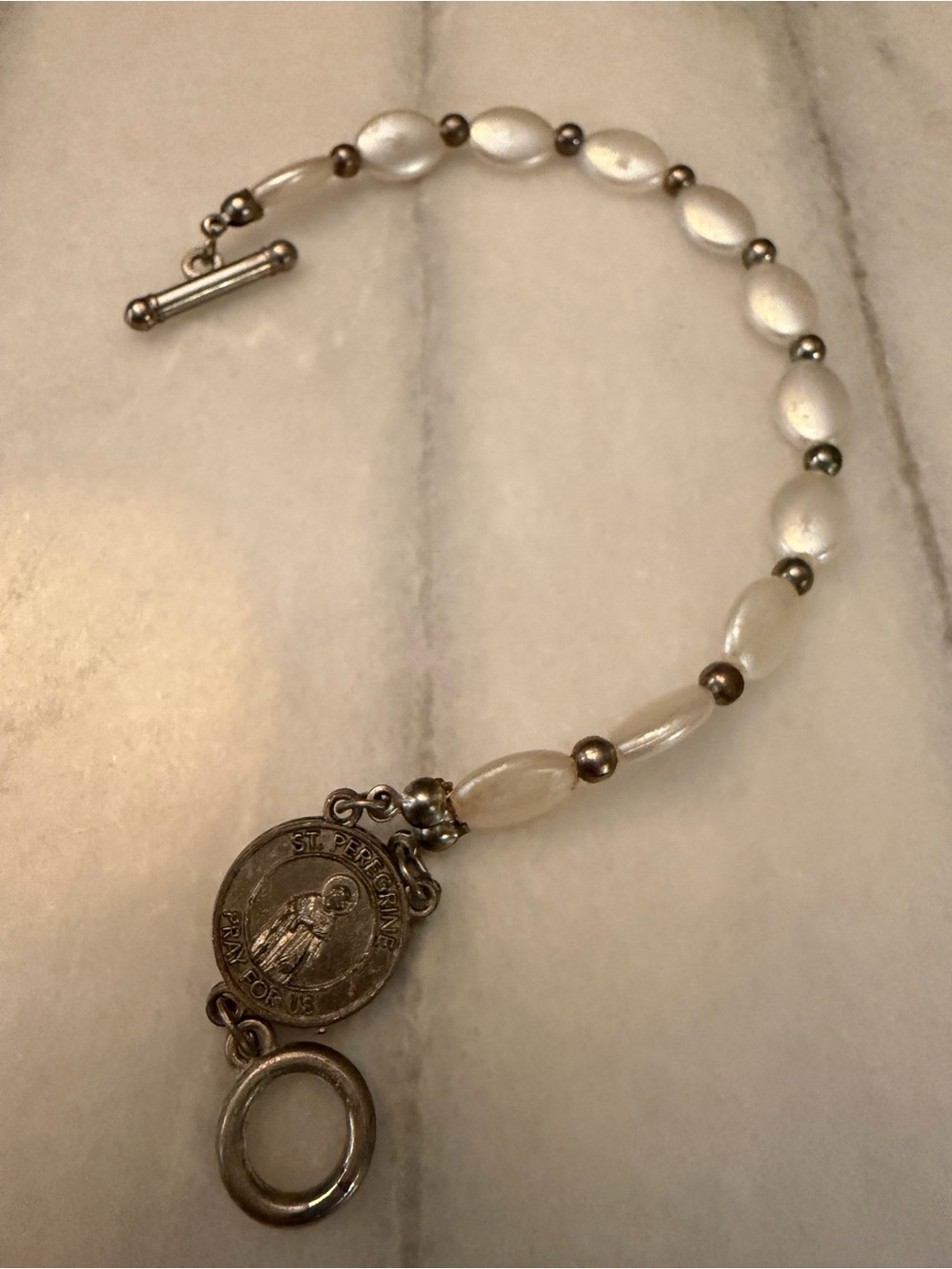 Mother of Pearl and Silver Toned Saint Medal Bracelet